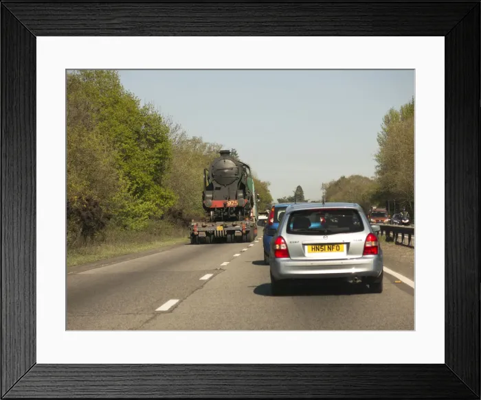 Framed Print : Locomotive being transported by heavy goods vehicle on A31 2015. Creator: Unknown Framed Print : Locomotive being transported by heavy goods vehicle on A31 2015. Creator: Unknown