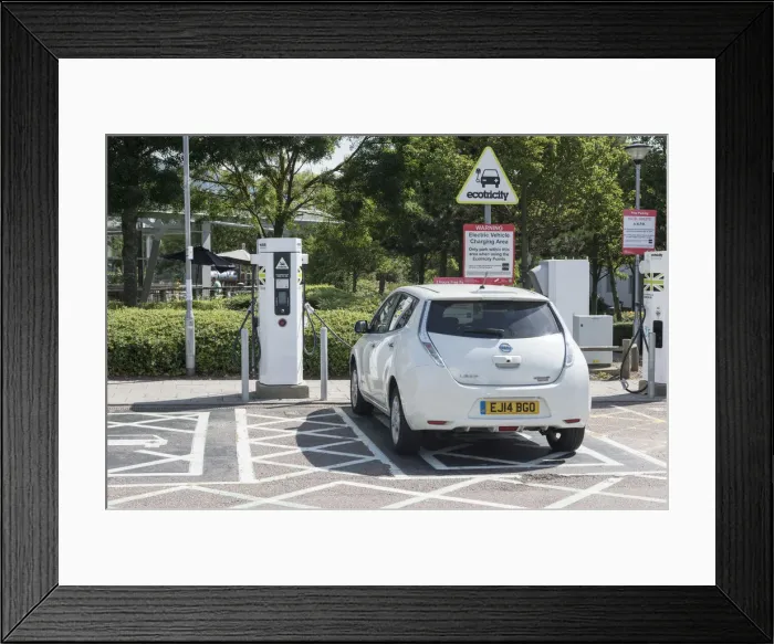 Framed Print : Nissan Leaf at elctric charging point 2015. Creator: Unknown Framed Print : Nissan Leaf at elctric charging point 2015. Creator: Unknown