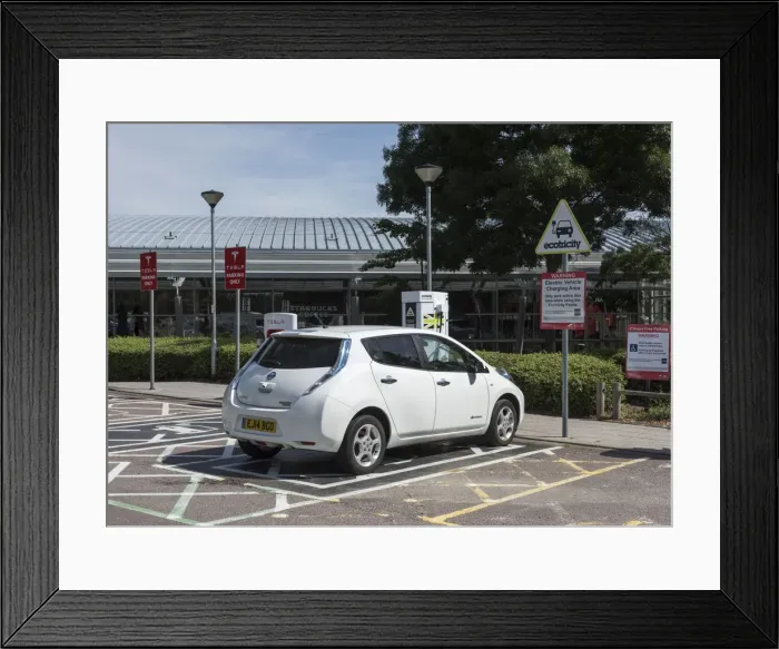 Framed Print : Nissan Leaf at elctric charging point 2015. Creator: Unknown Framed Print : Nissan Leaf at elctric charging point 2015. Creator: Unknown