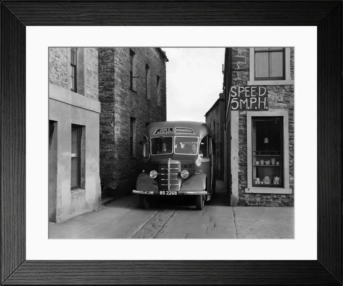 Framed Print : 1939-1952 Bedford OB coach in narrow street. Creator: Unknown Framed Print : 1939-1952 Bedford OB coach in narrow street. Creator: Unknown