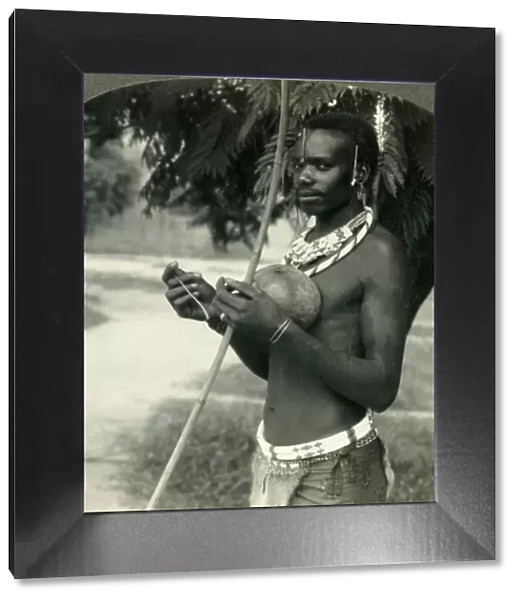 The Finery of a Native Hunter in the Belgian Congo, Africa, c1930s. Creator: Unknown