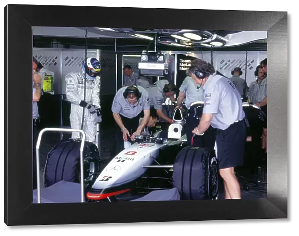 McLaren MP4 13, Mika Hakkinen in pits during practice for 1998 British Grand Prix