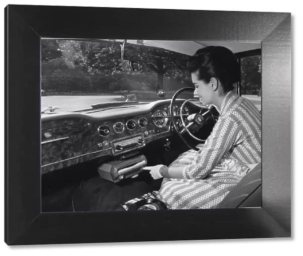 Phillips Auto Mignon in - car record player circa 1962. Creator: Unknown