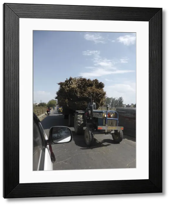 Framed Print : Tractor loaded with sugar cane, Uttarakhand, India. Creator: Unknown Framed Print : Tractor loaded with sugar cane, Uttarakhand, India. Creator: Unknown