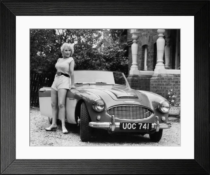 Framed Print : 1957 Austin - Healey 100-6 with model. Creator: Unknown Framed Print : 1957 Austin - Healey 100-6 with model. Creator: Unknown