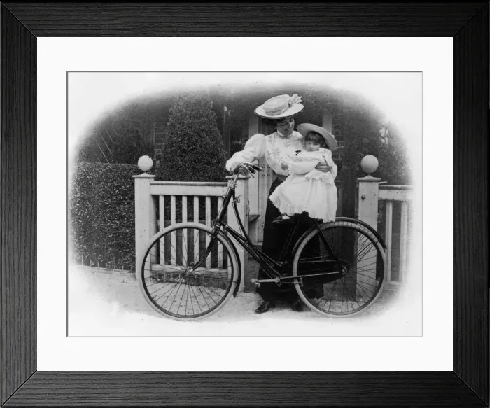 Framed Print : Beeston Humber cycle, Mrs. Hicks with child. Creator: Unknown Framed Print : Beeston Humber cycle, Mrs. Hicks with child. Creator: Unknown