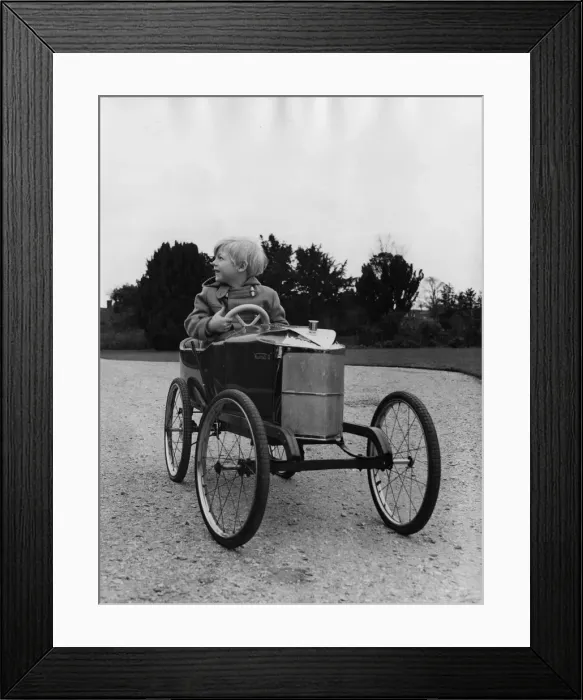 Framed Print : Ralph (Lord) Montagu as a child in Vauxhall pedal car 1966. Creator: Unknown Framed Print : Ralph (Lord) Montagu as a child in Vauxhall pedal car 1966. Creator: Unknown