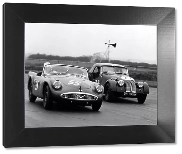 1961 Daimler SP250, Hon. B. Fielding and Morgan +4, Jones. At Silverstone. Creator: Unknown