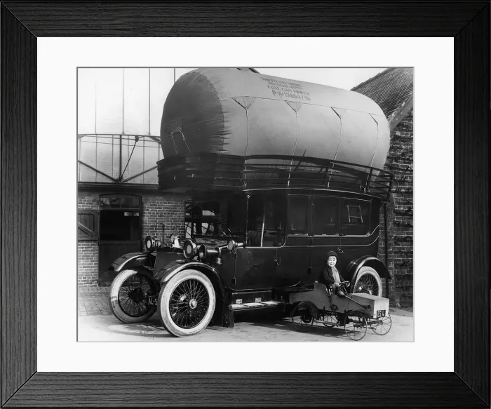 Framed Print : 1913 Lanchester with gas bag conversion and boy in pedal car. Creator: Unknown Framed Print : 1913 Lanchester with gas bag conversion and boy in pedal car. Creator: Unknown