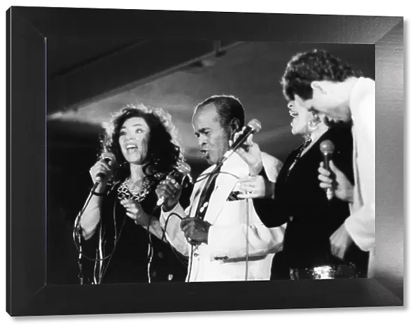 Jon Hendricks and three unidentified singers, c1998. Creator: Brian Foskett
