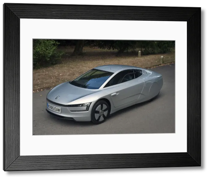 Framed Print : 2014 Volkswagen XL1 Hybrid. Creator: Unknown Framed Print : 2014 Volkswagen XL1 Hybrid. Creator: Unknown