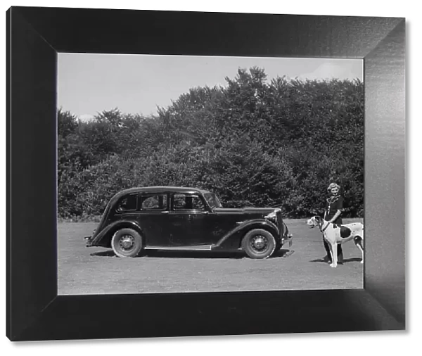 1938 Daimler DB18 with lady and her pet dog. Creator: Unknown