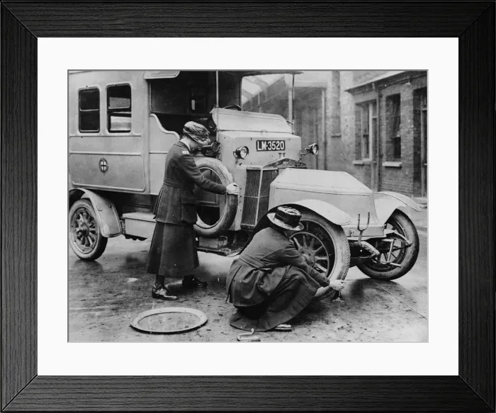 Framed Print : Siddeley Deasy ambulance 1911, women changing wheel. Creator: Unknown Framed Print : Siddeley Deasy ambulance 1911, women changing wheel. Creator: Unknown