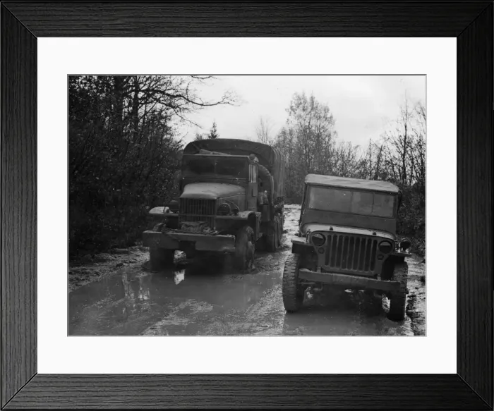 Framed Print : GMC 352 CCKW and Willys Jeep circa 1944. Creator: Unknown Framed Print : GMC 352 CCKW and Willys Jeep circa 1944. Creator: Unknown