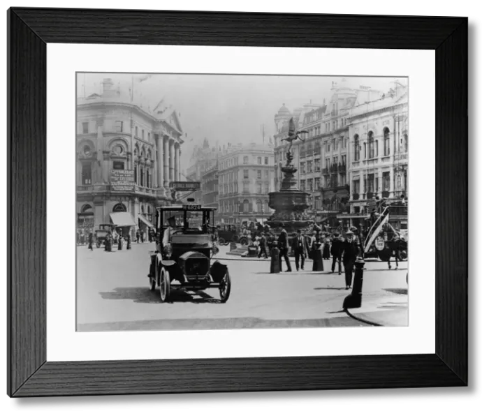 Framed Print : Unic taxi in Piccadilly circus, London circa 1910. Creator: Unknown Framed Print : Unic taxi in Piccadilly circus, London circa 1910. Creator: Unknown