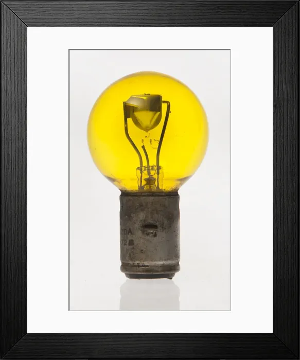 Framed Print : Yellow headlamp bulb. Creator: Unknown Framed Print : Yellow headlamp bulb. Creator: Unknown
