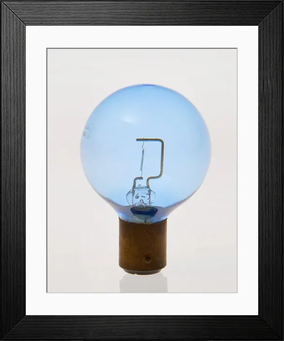 Framed Print : Blue headlamp bulb circa 1930. Creator: Unknown Framed Print : Blue headlamp bulb circa 1930. Creator: Unknown