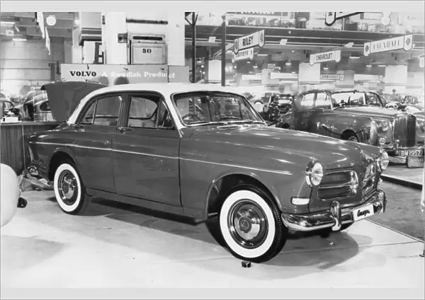 1956 Volvo 120 Amazon at motor show. Creator: Unknown