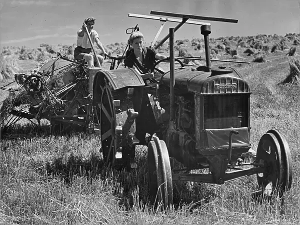 Fordson tractor, with Land girls 1940 s. Creator: Unknown