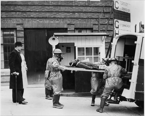 Volunteer stretcher party at Vauxhall factory, Wing Commander Hodsall, WW2 Creator: Unknown