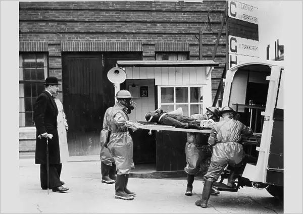 Volunteer stretcher party at Vauxhall factory, Wing Commander Hodsall, WW2 Creator: Unknown