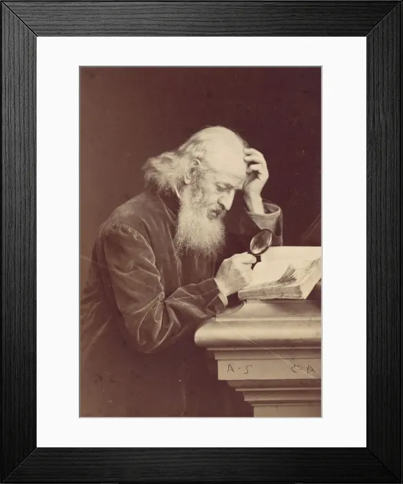 Framed Print : [Bearded Man with Magnifying Glass Examining a Manuscript], 1870s