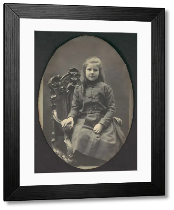 Framed Print : [Girl with Ringlets, Seated, Three-Quarter Length], 1890s. Creator: Frederick Gutekunst
