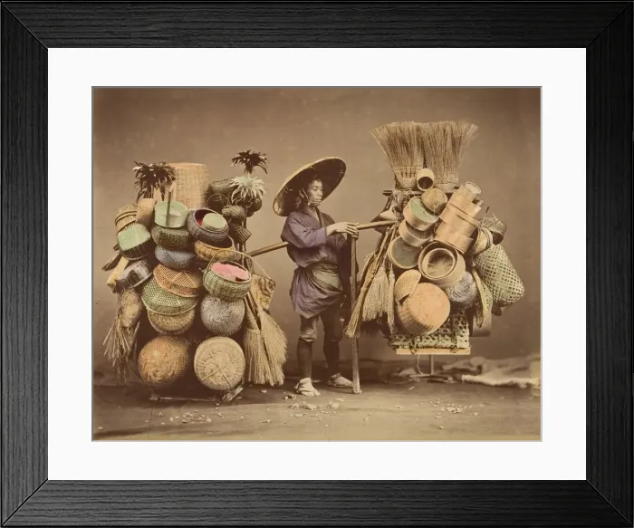 Framed Print : [Japanese Man Posing with Baskets, Brooms and Feather Dusters], 1870s. Creator: Unknown