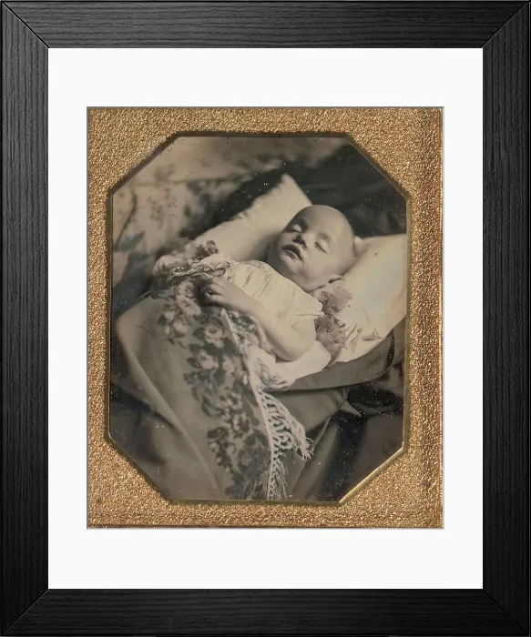 Framed Print : Postmortem Baby, Partially Covered by a Flowered Shawl with a Fringe Hem, 1840s Framed Print : Postmortem Baby, Partially Covered by a Flowered Shawl with a Fringe Hem, 1840s
