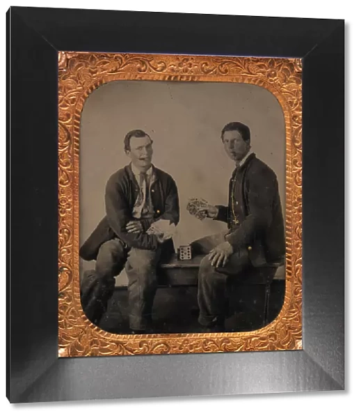 Union Soldiers Sitting on Bench, Playing Cards, 1861-65. Creator: Unknown
