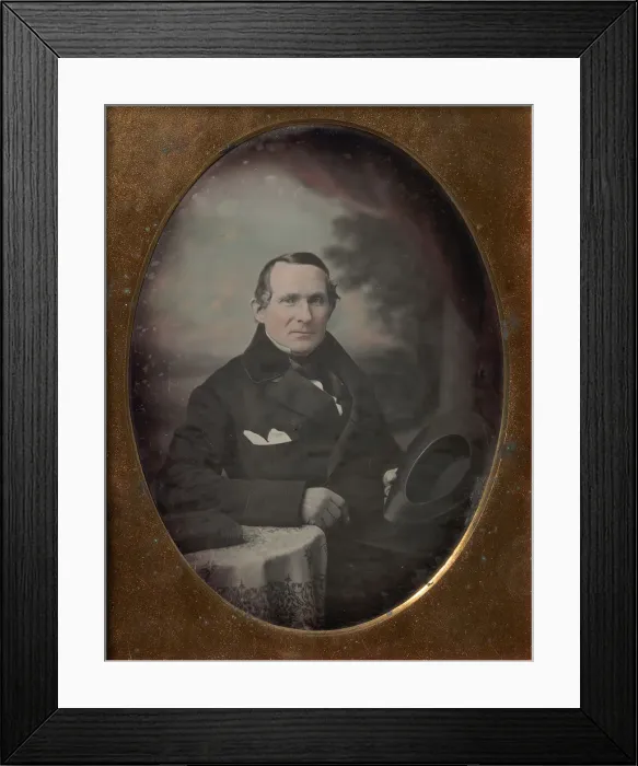 Framed Print : Man Wearing Coat and Gloves, Holding Hat, Seated in Front of Painted Outdoor Backdrop Framed Print : Man Wearing Coat and Gloves, Holding Hat, Seated in Front of Painted Outdoor Backdrop