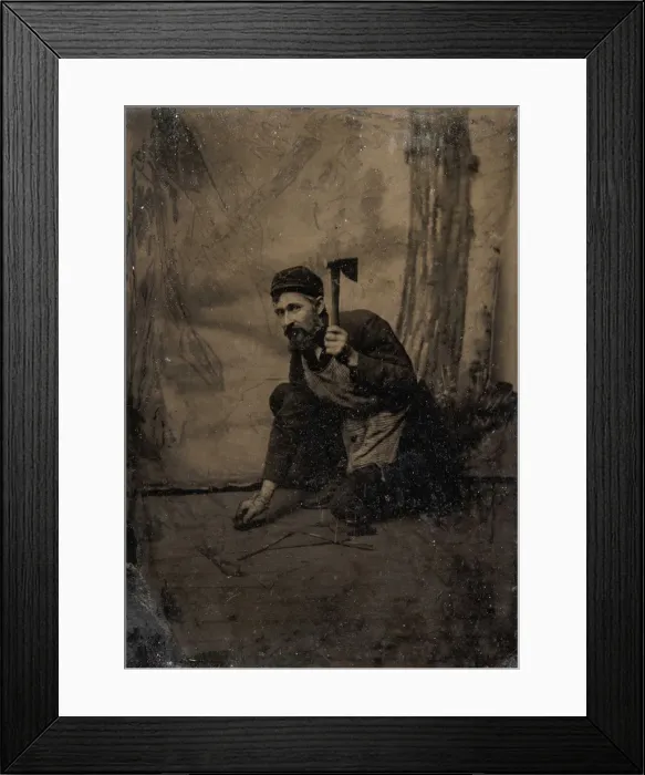 Framed Print : [Kneeling Carpenter Holding a Nail and Raised Hammer], 1870s-80s. Creator: Unknown