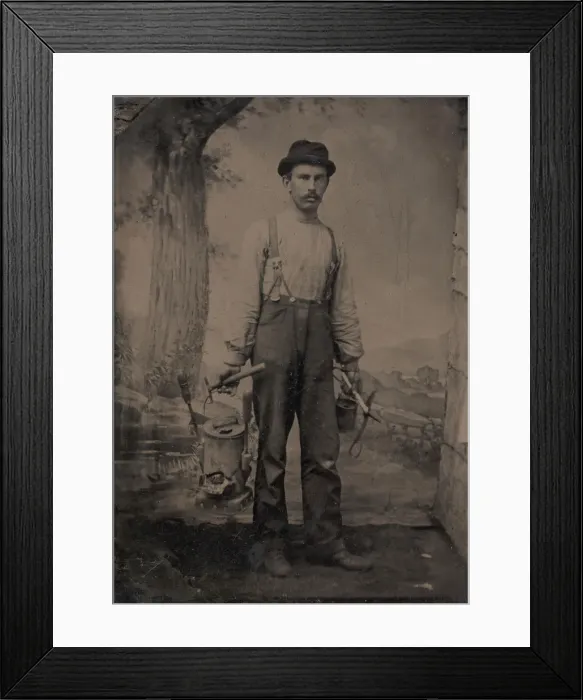 Framed Print : Tinsmith in Front of Painted Outdoor Backdrop, 1860s-70s. Creator: Unknown Framed Print : Tinsmith in Front of Painted Outdoor Backdrop, 1860s-70s. Creator: Unknown