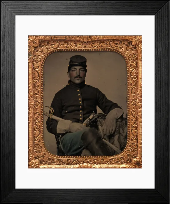 Framed Print : Union Cavalry Soldier, Seated, with Sword and Handgun, 1861-65. Creator: Unknown Framed Print : Union Cavalry Soldier, Seated, with Sword and Handgun, 1861-65. Creator: Unknown