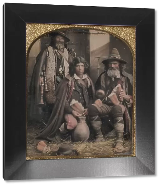 Three Men in Shepherd Attire, One with Bagpipes, the Other Two Holding Bread, 1850s