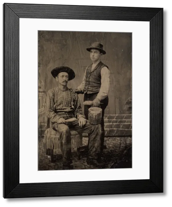 Framed Print : Two Painters, One Seated and One Standing, with Brushes and a Bucket, 1860s-80s Framed Print : Two Painters, One Seated and One Standing, with Brushes and a Bucket, 1860s-80s