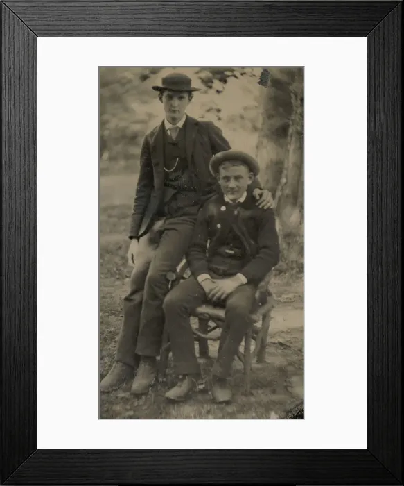 Framed Print : Two Young Men Outdoors, One Seated, the Other on the Arm of the Chair, 1880s Framed Print : Two Young Men Outdoors, One Seated, the Other on the Arm of the Chair, 1880s