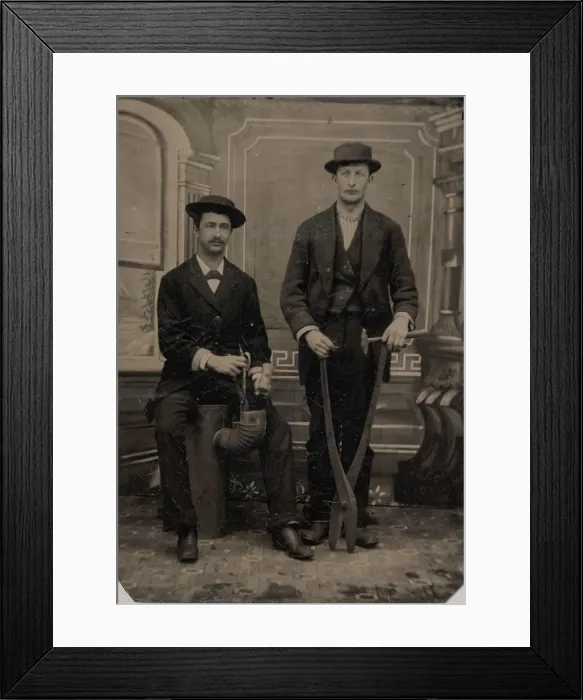Framed Print : Two Stovepipe Makers, One with a Hammer and Tin Snips... 1880s. Creator: Unknown Framed Print : Two Stovepipe Makers, One with a Hammer and Tin Snips... 1880s. Creator: Unknown