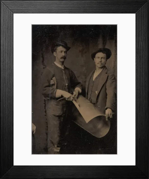 Framed Print : Two Tinsmiths Cutting a Curled Sheet of Metal, 1880s. Creator: Unknown Framed Print : Two Tinsmiths Cutting a Curled Sheet of Metal, 1880s. Creator: Unknown