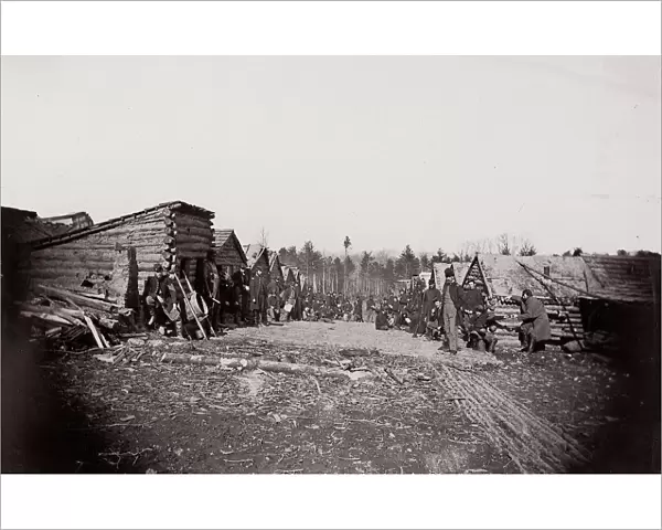 [Winter Quarters, troops with row of cabins]. Brady album, p. 128, 1861-65