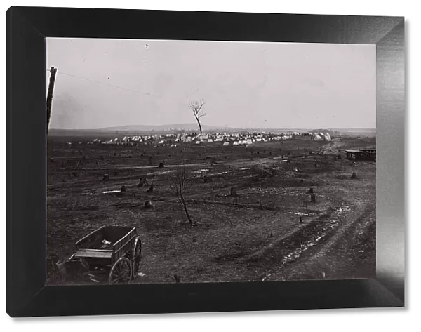 [Wagon in a landscape with army encampment in the distance]. Brady album, p. 125, 1861-65