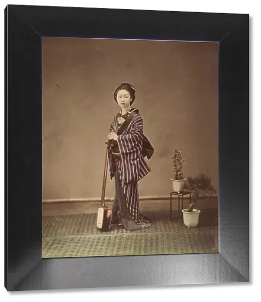 [Japanese Woman in Traditional Dress Posing with Instrument], 1870s. Creator: Unknown