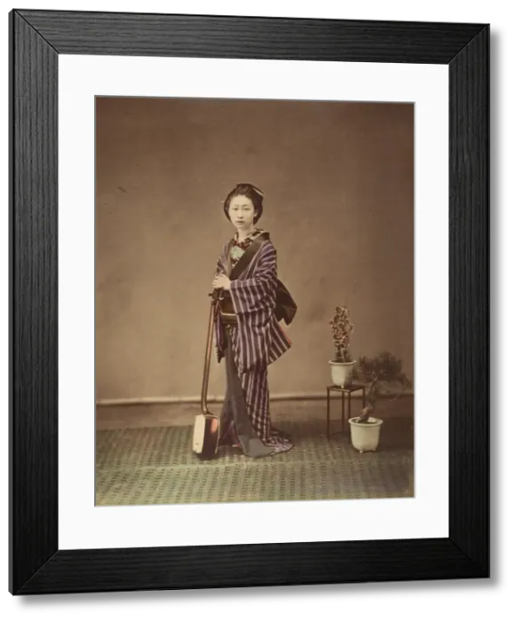 Framed Print : [Japanese Woman in Traditional Dress Posing with Instrument], 1870s. Creator: Unknown
