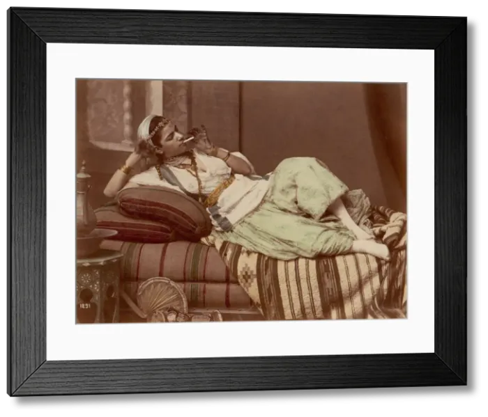 Framed Print : [Reclining Woman Smoking], 1870-90. Creator: Unknown