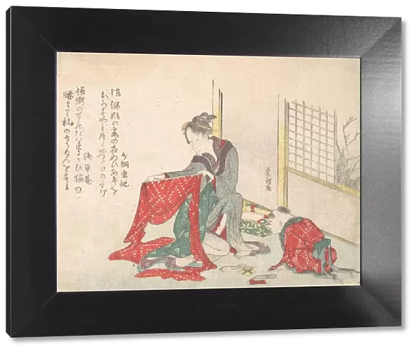 Woman Folding Cloth, late 18th-early 19th century. Creator: Hokusai
