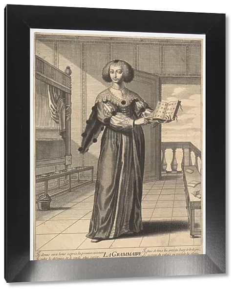 Grammar: a young woman standing in a decorated interior holding an open book in her lef