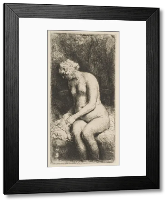 Framed Print : Woman Bathing Her Feet at a Brook, 1658. Creator: Rembrandt Harmensz van Rijn Framed Print : Woman Bathing Her Feet at a Brook, 1658. Creator: Rembrandt Harmensz van Rijn