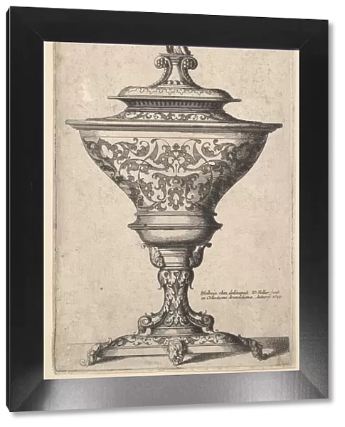 Ornate goblet on feet of masks, 1645. Creator: Wenceslaus Hollar