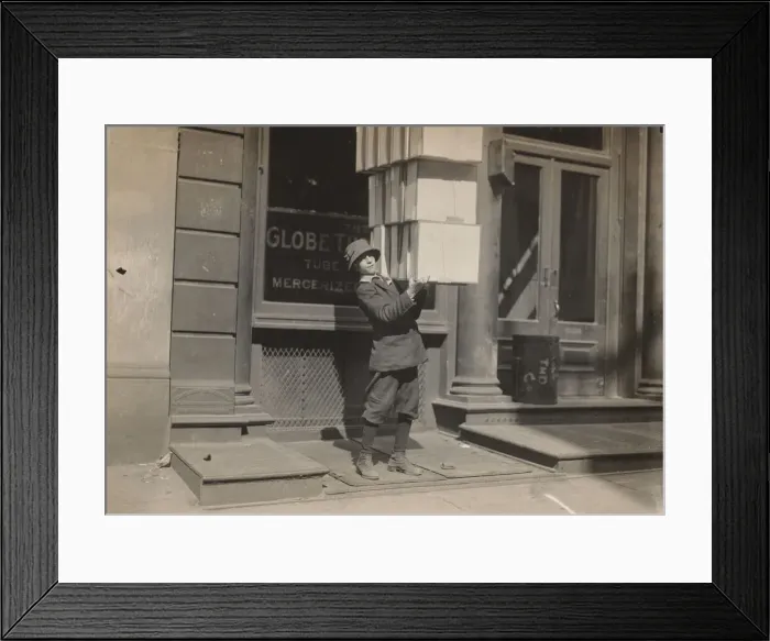 Framed Print : Wagon boy or tail boy'helping to load the wagon, c. 1914