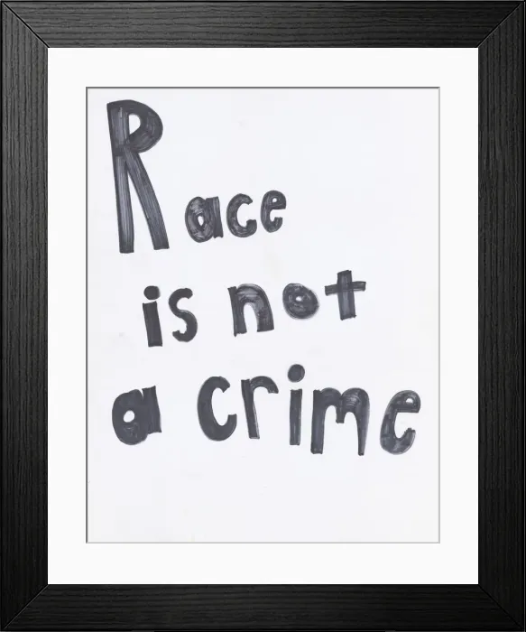 Framed Print : Poster reading Race is not a crime'used at Baltimore protests, April 2015 Framed Print : Poster reading Race is not a crime'used at Baltimore protests, April 2015